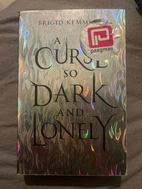 9781408884614-A-Curse-So-Dark-and-Lonely